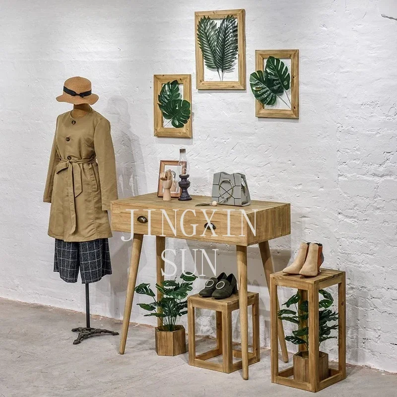 Clothing store booth water table combination women's clothing store floor-to-ceiling window table