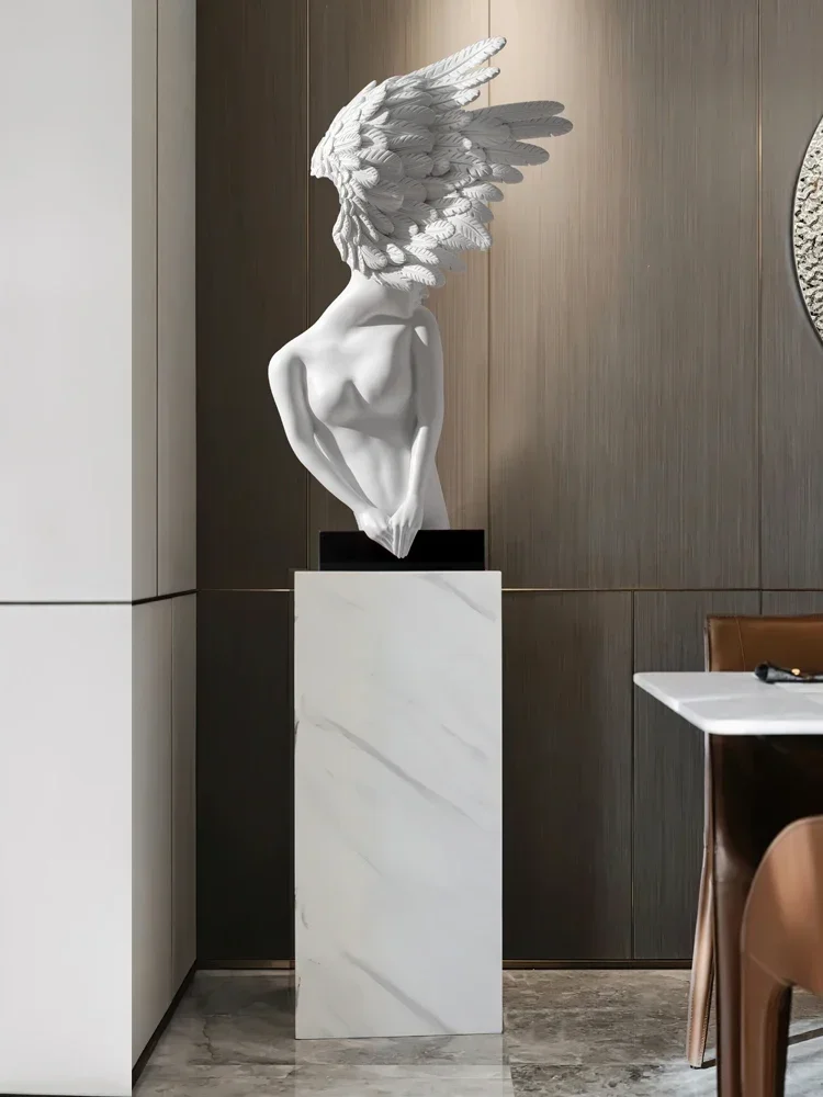 Modern art hotel villa living room decoration. Creative light luxury art angel sculpture decoration.