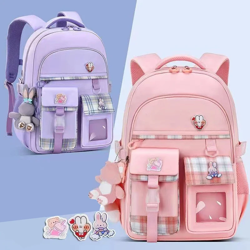 Beliebte rosa lila Farbe Mädchen High School Schüler Rucksack Taschen Oxford Rucksack für Frauen klassische kausale Puppe Anhänger Tasche