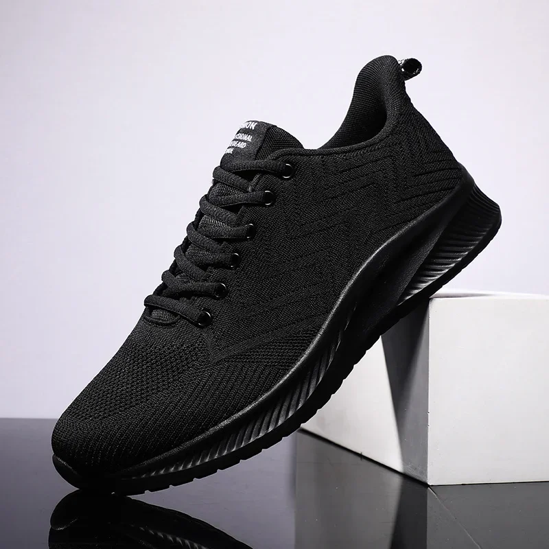 Zapatos informales de moda para hombre, zapatillas ligeras transpirables para caminar al aire libre, zapatos planos con cordones, zapatos de talla grande