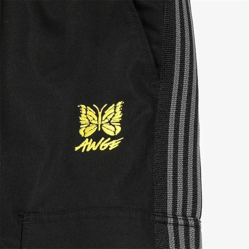 Black Needles Work Pants High Quality 1:1 Mens Womens Knitted Striped Smooth Fabric Butterfly Logo Sports AWGE Trousers