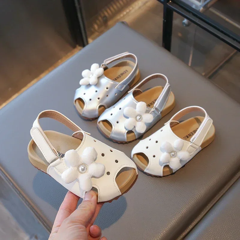 

Новинка 2023 года, летние детские сандалии с цветочным принтом, милые пляжные сандалии для девочек, милые полые детские модные повседневные сандалии принцессы