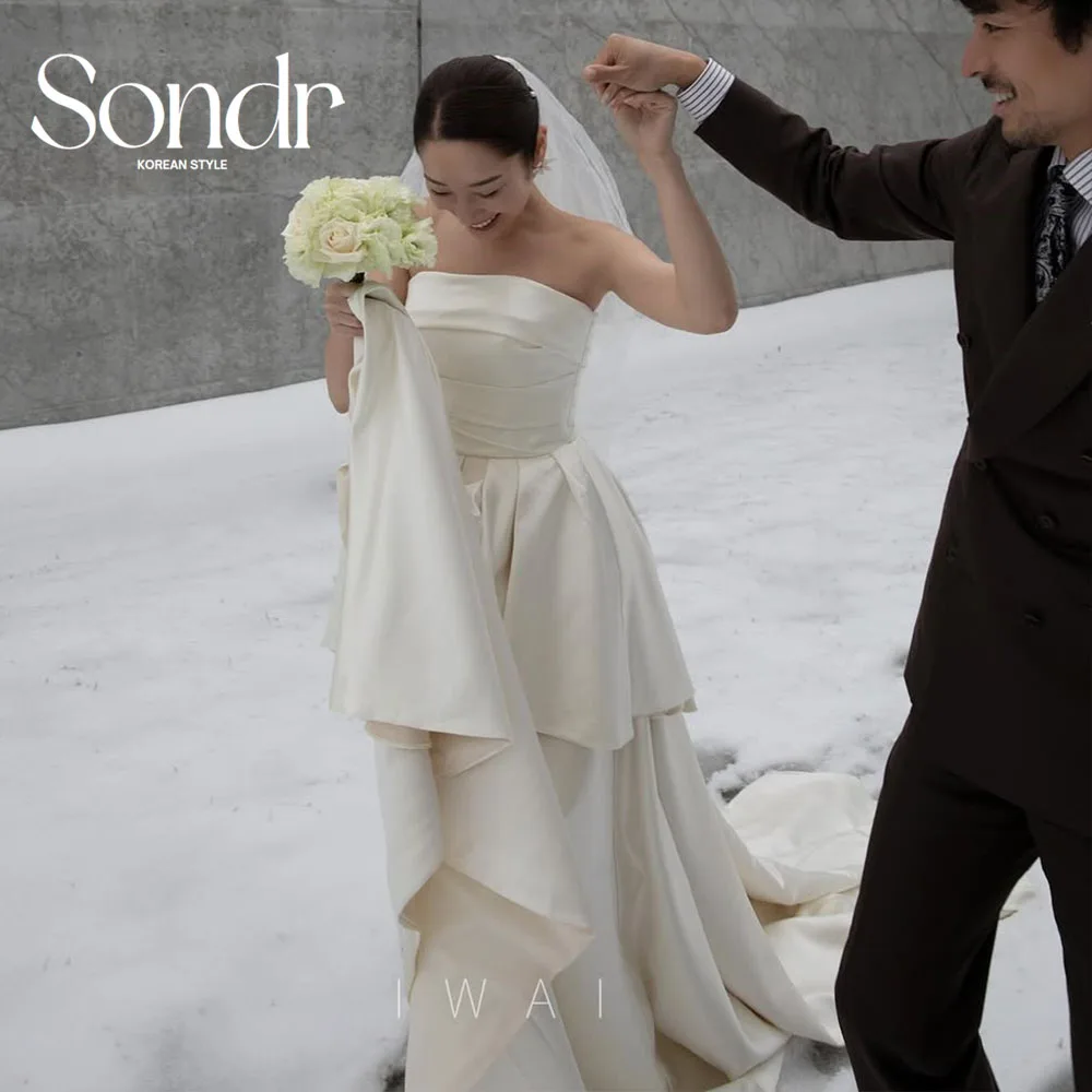 فساتين زفاف كورية جديدة من Sondr من الحرير والساتان بدون حمالات فستان شتوي للتصوير الفوتوغرافي مخصص على شكل حرف A فساتين زفاف ذاتية 2026