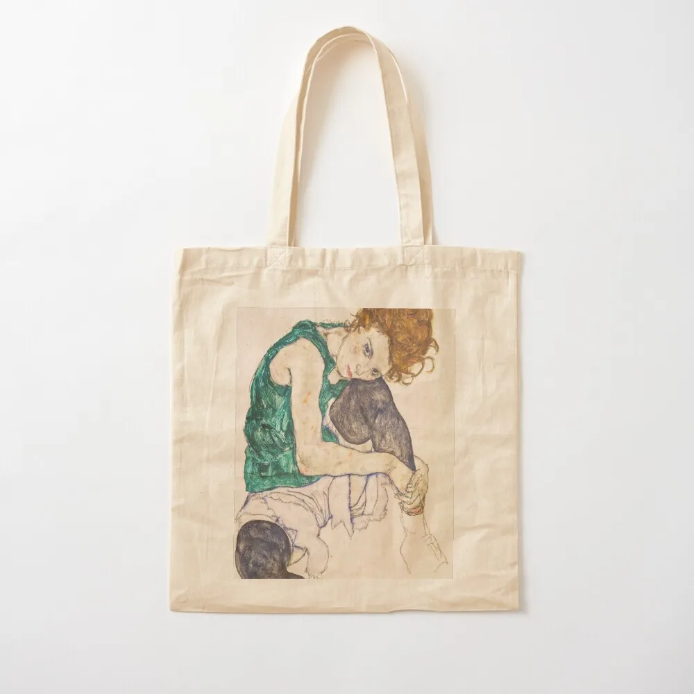 Egon Schiele - Seated Woman with Legs Drawn Up (Adele Herms) (Sitzende Frau mit angezogenem Knie) 1917 Tote Bag