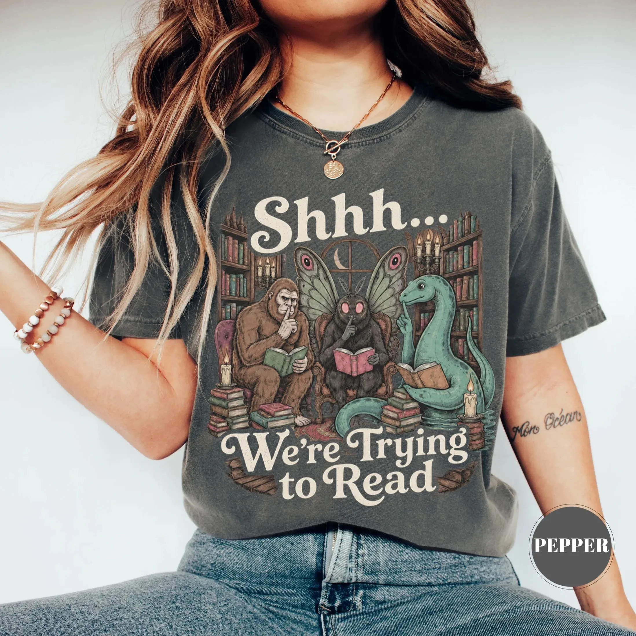 Shh, We're Looking At Mysterious Creature T-shirts with Themes of Bigfoot Moth Man and Loch Ness Monster Fun Bookworm T-shirts