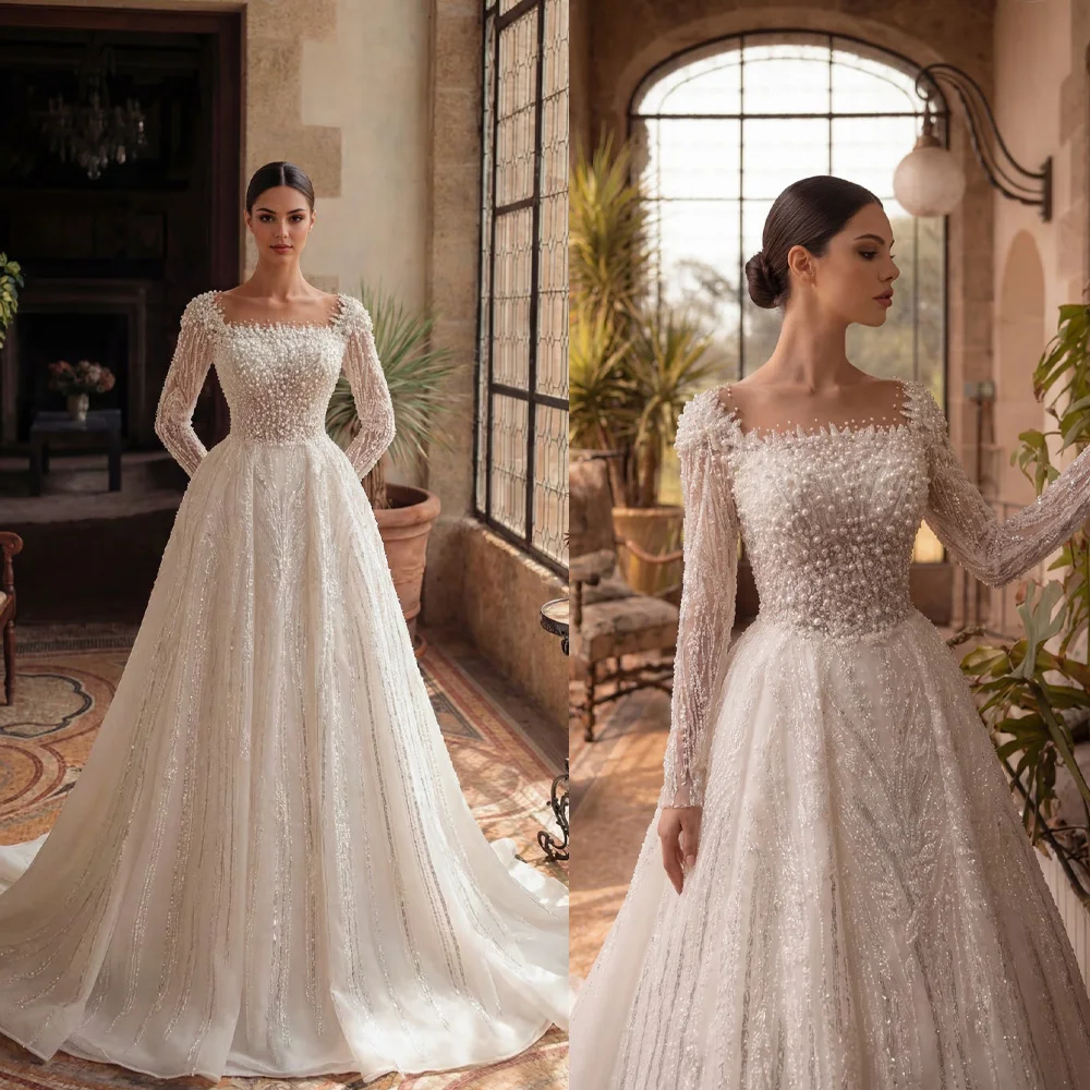 Modische Hochzeitskleider, Designer-Brautkleid mit Herzausschnitt, Applikationen, Perlen, Tüll, langen Ärmeln und Schleppe, maßgeschneidert, Robe De Mariée