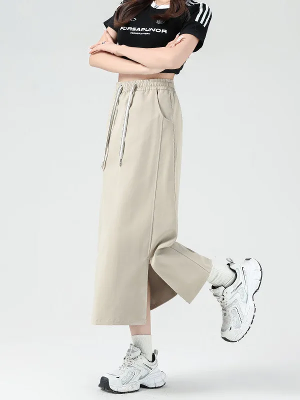 

Женская модная вязаная юбка миди с высокой талией и разрезом в стиле ретро, из тонкого полиэстера, универсальная, с лоскутным дизайном