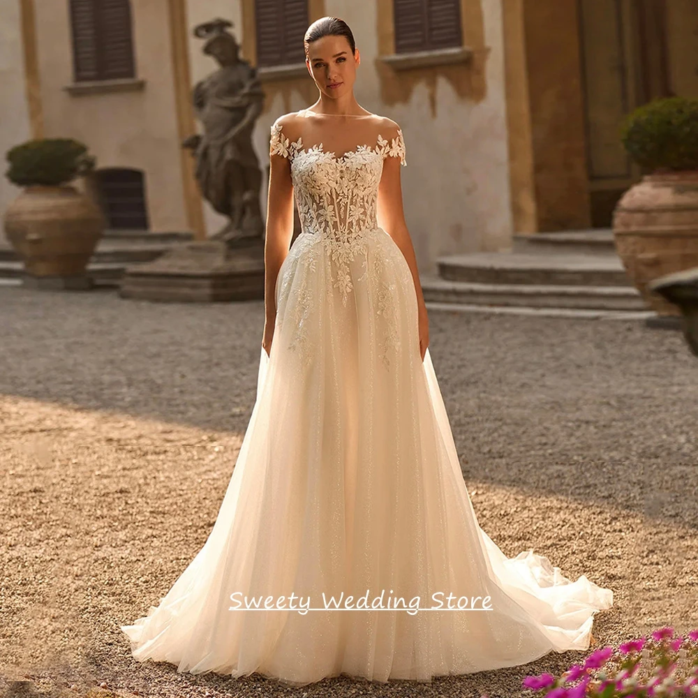 Customized Vestido De Noiva Wedding Dress Sexy Cap Sleeve See Through Lace Applqiue Sweep Train A Line Glitter Bridal Gown
