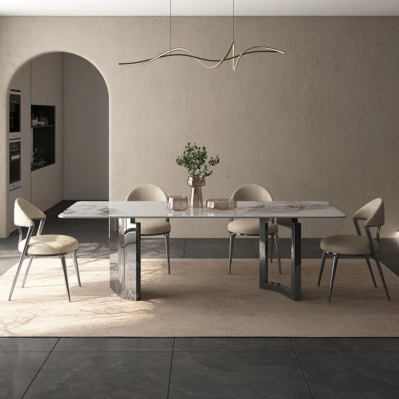 

Italian light luxury extremely simple rock slab dining table creative designer small apartment stainless steel rectangular dinin