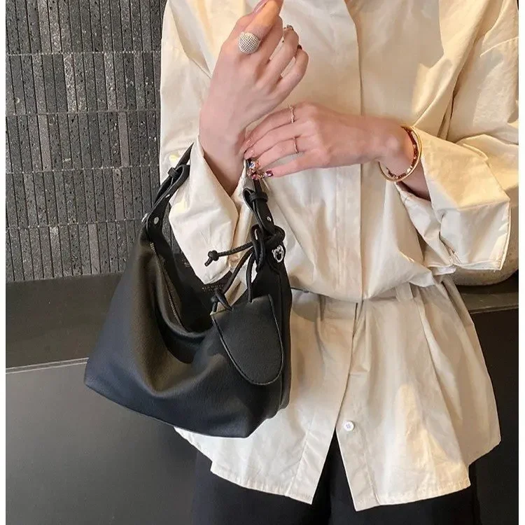 

Сумка-кроссбоди 2026: Новая корейская модель в стиле Lazy, однотонная, элегантная, для повседневного использования, сумка-пельмень на одно плечо