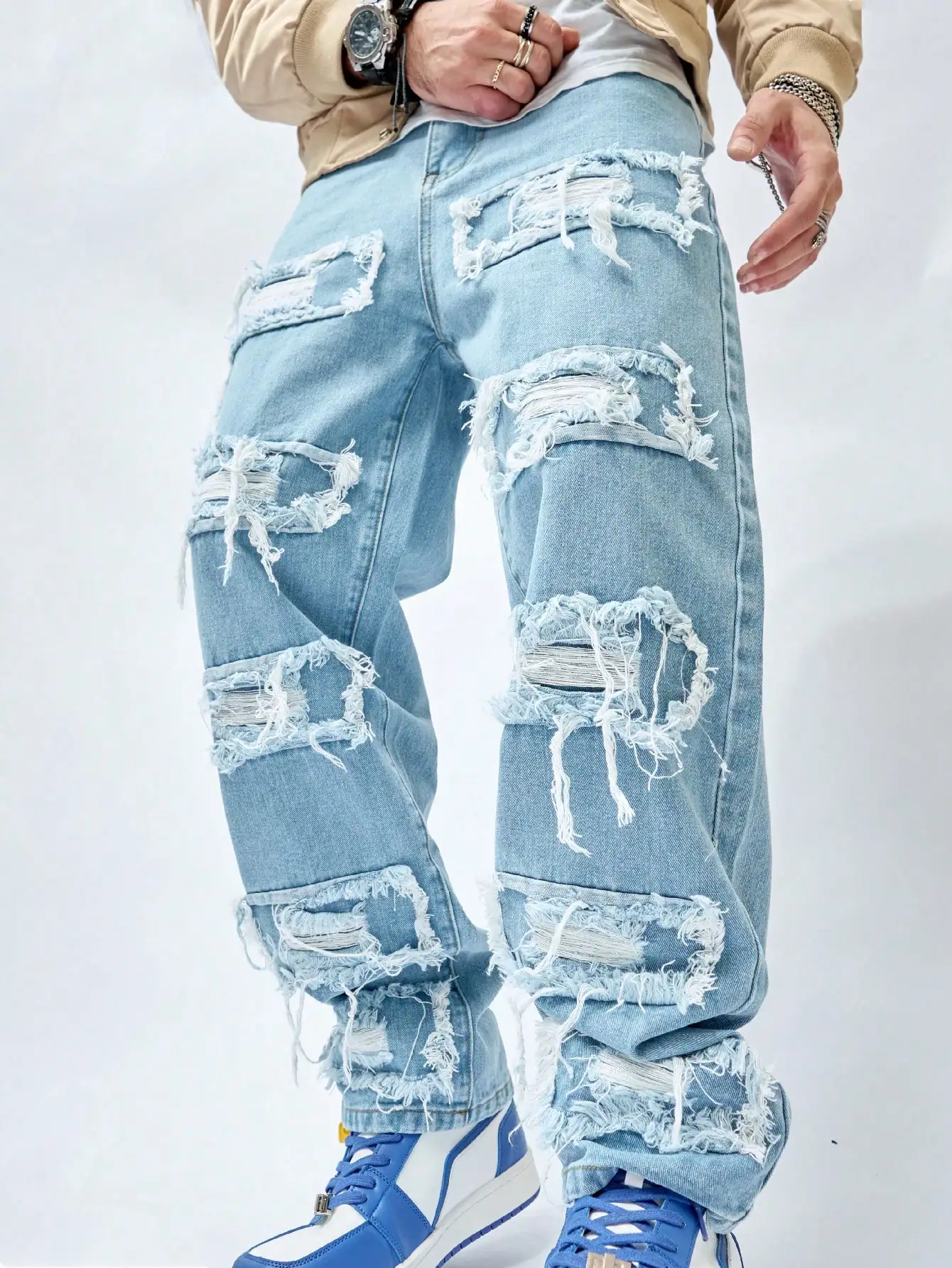 

GELITAYIN Men's Ripped Jeans For Spring And Autumn. Street - Trendy Light Blue Plus - Size Denim Long Pants. Loose Fit.