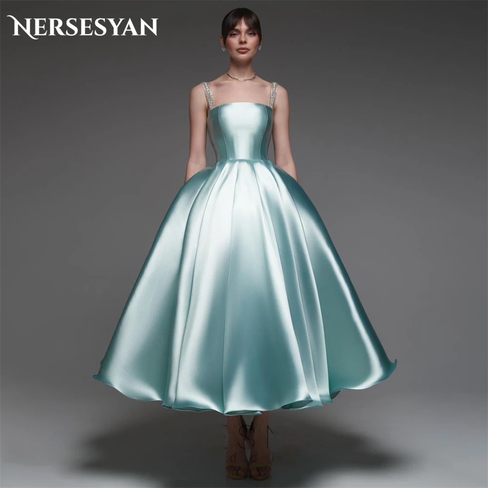 

Nersesyan Glitter Satin Prom Dresses Beading Spaghetti Straps Sleeveless Ball Gowns Backless Tea Length Party Gowns Customized