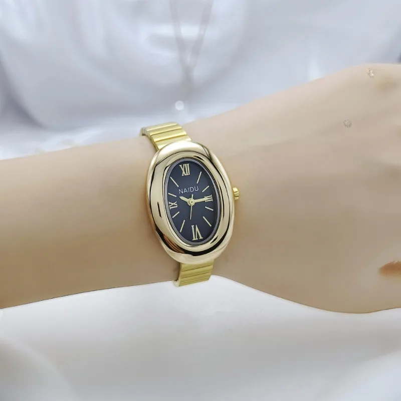 Nuovo orologio al quarzo da donna di fascia alta Orologio ovale in oro di lusso Orologio in acciaio inossidabile Orologio da donna Moglie Regalo di Natale