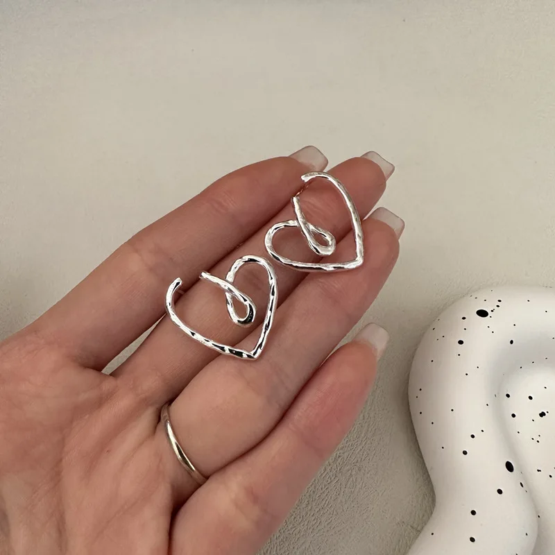 

Lady Simple S925 Sterling Silver Korean Hollow Heart Shape Love Earrings