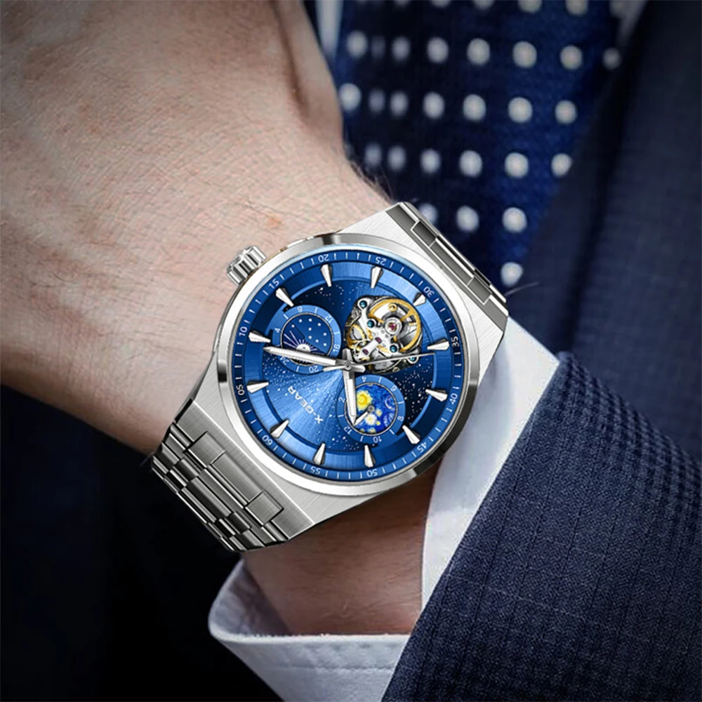 ساعة X-GEAR للرجال بحركة ميكانيكية وسوار من الفولاذ المقاوم للصدأ وهيكل عظمي ممتاز ومضيئة ومقاومة للماء