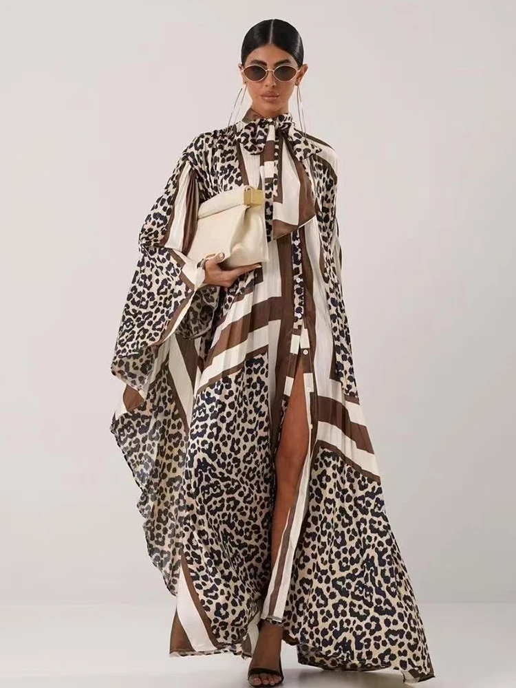 Sukienka damska z nadrukiem w stylu retro geometrycznym, kołnierzykiem w kształcie kokardy, zapinana na jeden guzik, z rękawami typu \"batwing\", bufiaste spódnice, luźna plisowana spódnica, kolekcja jesień 2025.