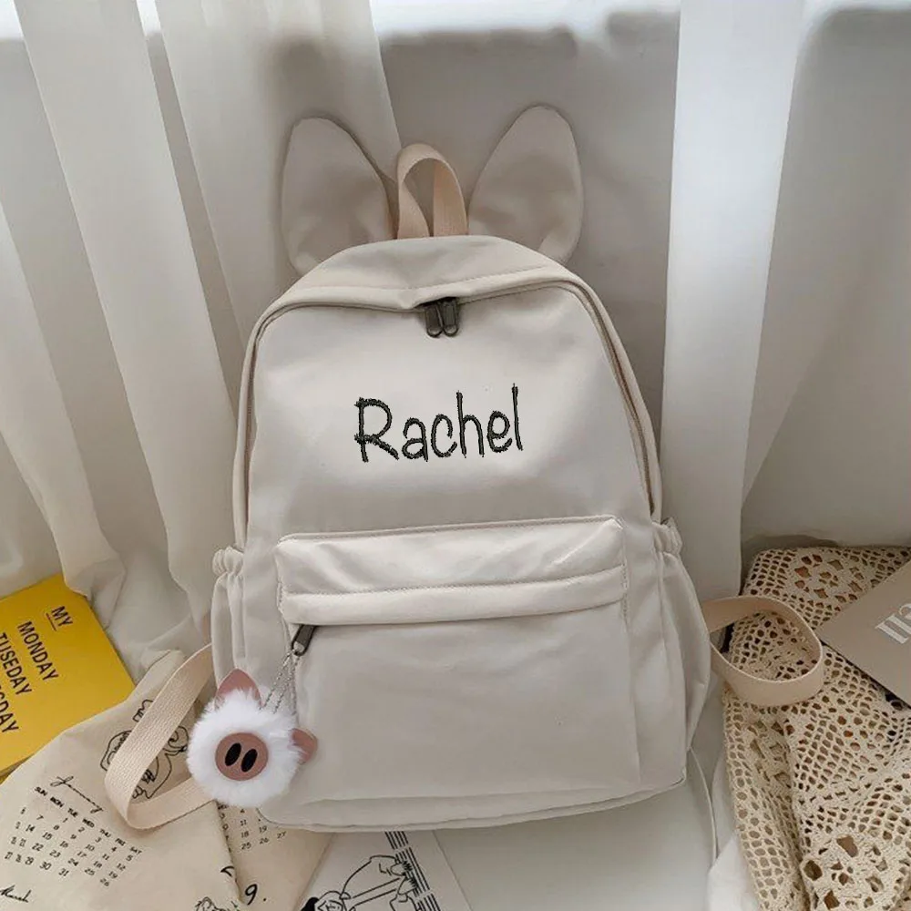 

Embroidered New Fashionable And Minimalist Rabbit Ear Nylon Cloth Backpack, Name Custom Male And Female Student Travel Gift Bags