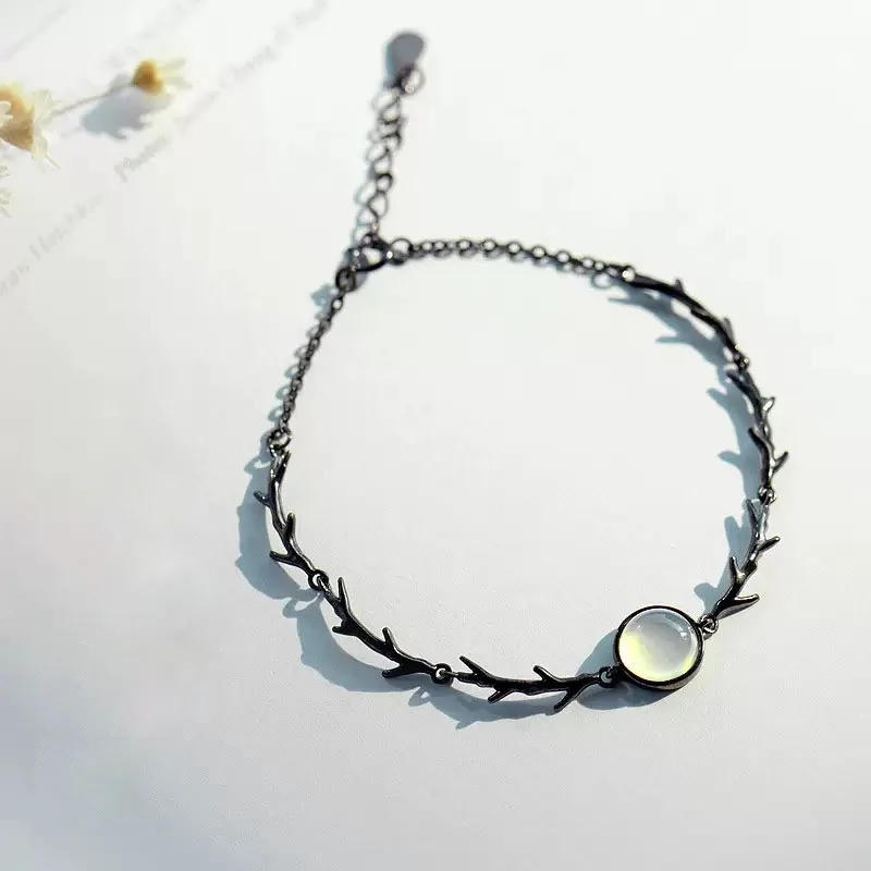 

French light luxury 925 sterling silver new leaf bracelet forest simple black gold and white cat's eye stone niche accessories