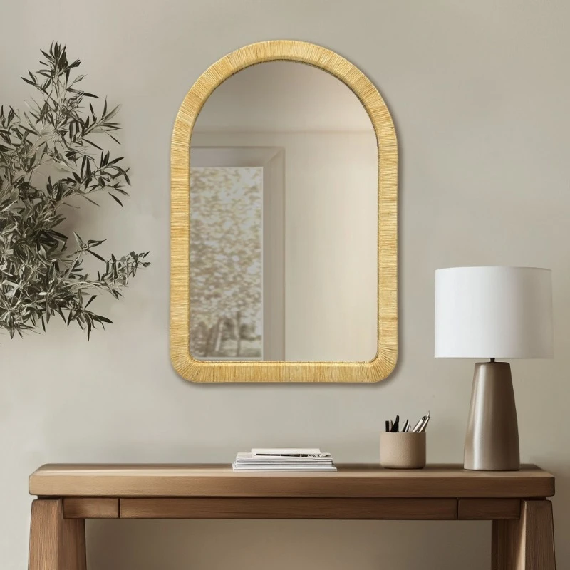 Modern natural rattan arched wall mirror decorates home interior