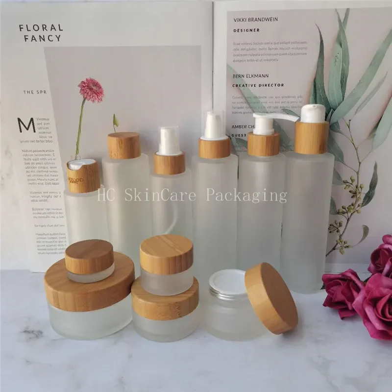 

whosesaleLuxury Cosmetic Packaging Frosted Glass Empty Toner Spray Bottle Natural Bamboo Body Lotion Containers Packaging bottle