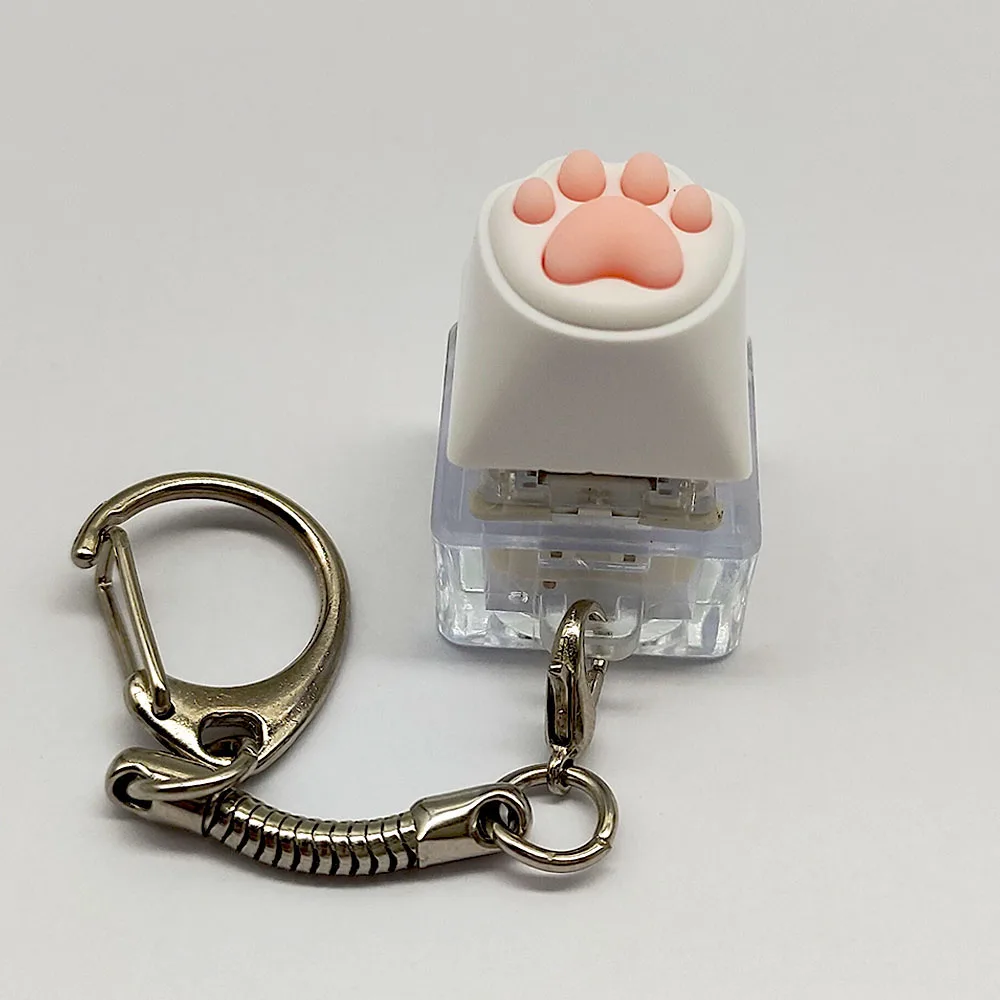 Chaveiro Squishy Patinha de Gato Fofa - Brinquedo de Silicone Macio para Alívio do Estresse, Decoração para Mochilas e Bolsas, Presente Antiestresse para Amantes de Gatos, Casais e Estudantes
