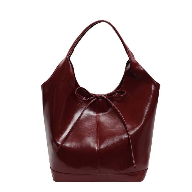 Elegant Burgundy Oil Wax Leather Large Capacity Bucket Bag 2024 New Women\'s Bow Magnetic Buckle Shoulder Bags Commuter Handbag