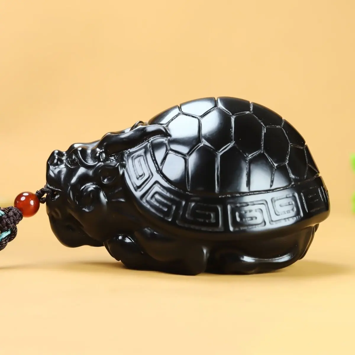 

Xinjiang genuine Hetian jade dragon turtle ink jade hand handle sapphire small handle men and women jade hand play pendant