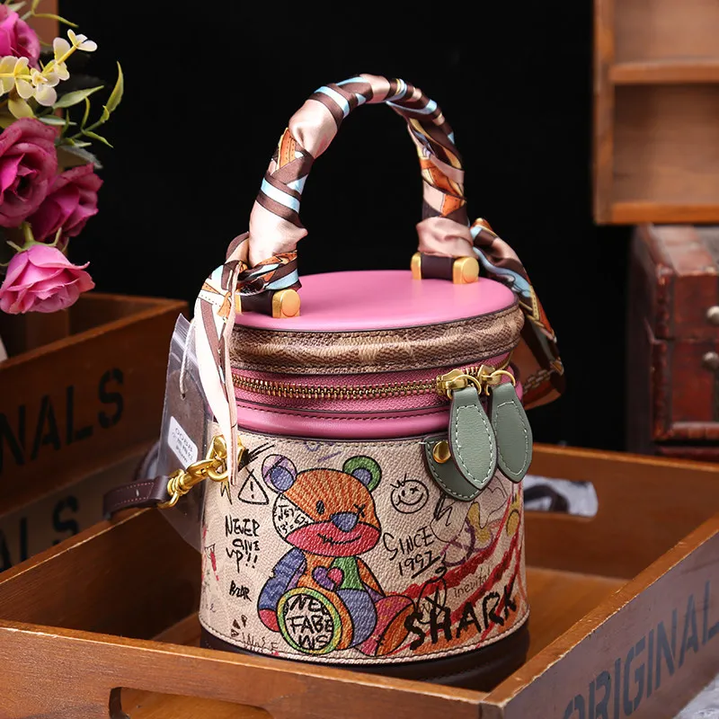 Vintage and Luxury Handheld Bucket Bag with Delicate Cartoon Graffiti and Beautiful Scarves 2026 Women New Fashion Crossbody Bag