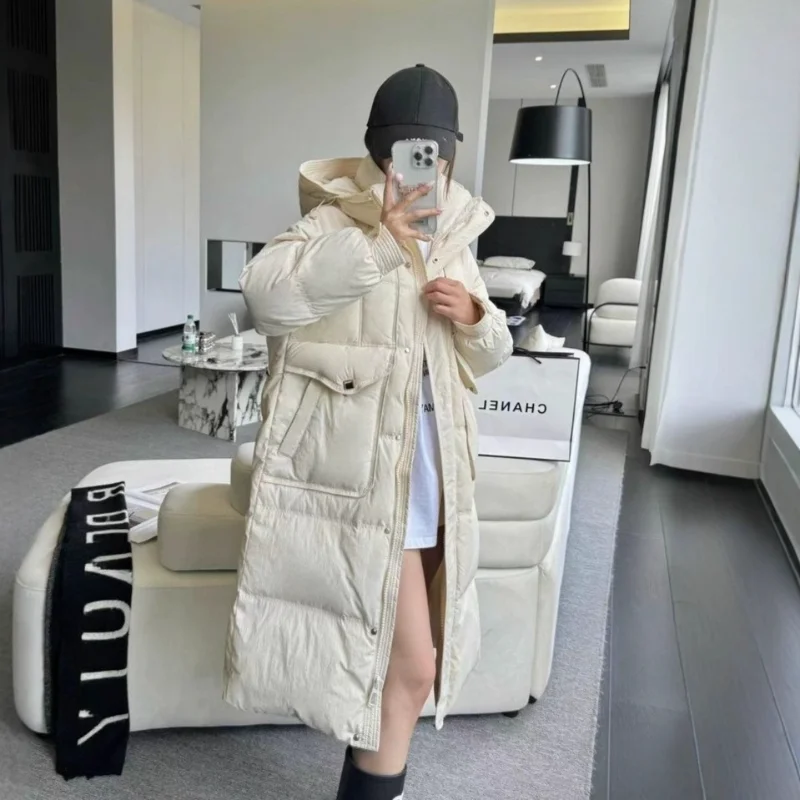 Chaqueta larga de plumón para mujer, moda de invierno 2025, estilo viajero, abrigo cálido adelgazante versátil y grueso elegante a la moda