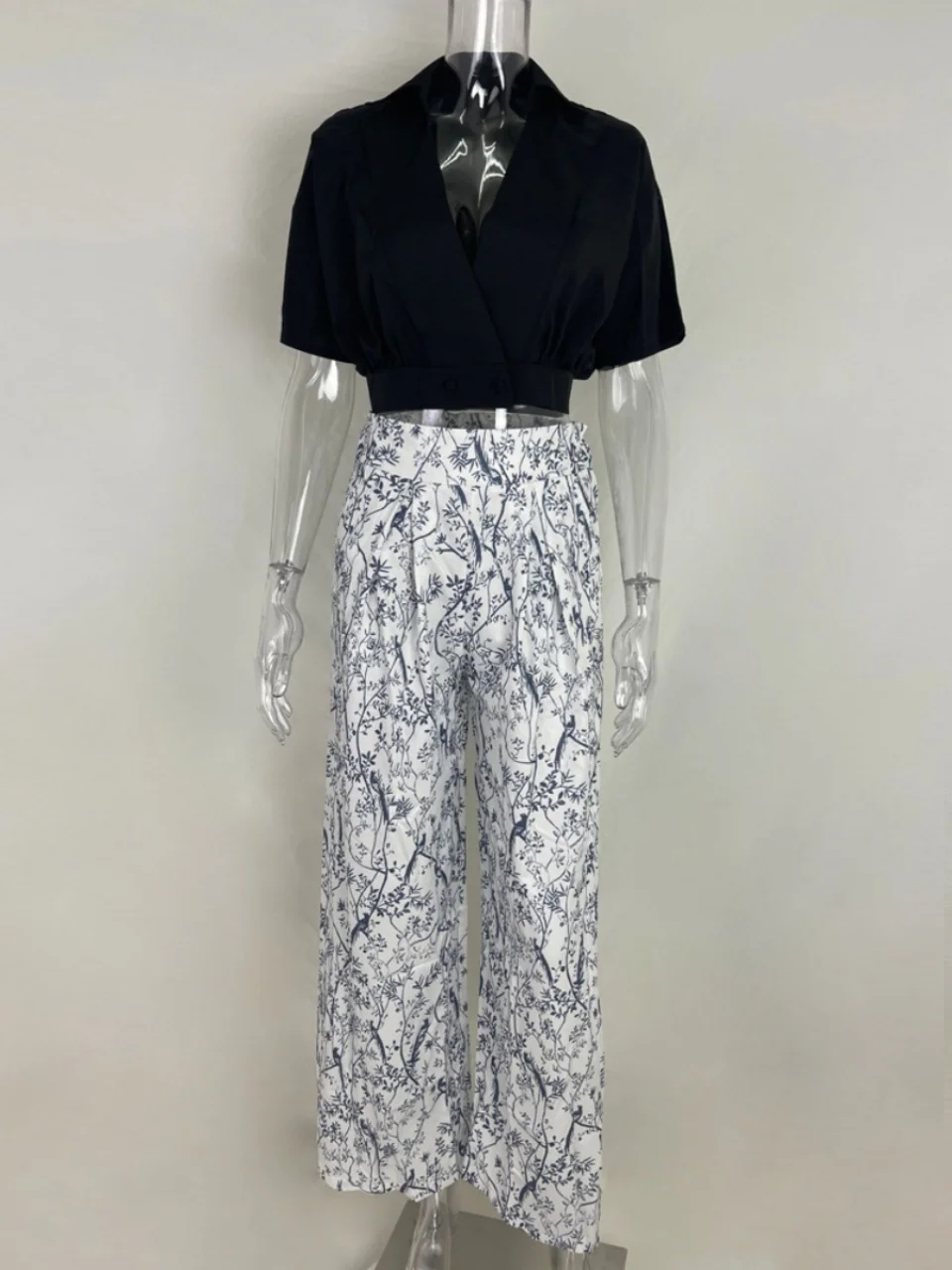 Hoge taille bedrukte broek met wijde pijpen Street Sle Casual broek Lange broek Faionable Eenvoudig ontwerp Zomercollectie