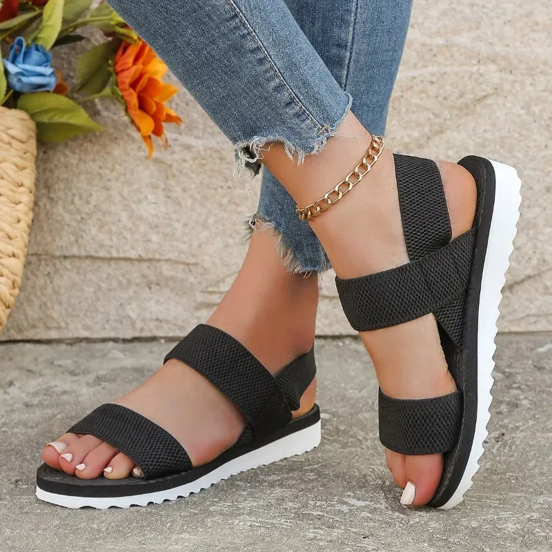 

Women's fashion trend anti-slip wear comfortable matching color sole pure black shoelace flat sandals