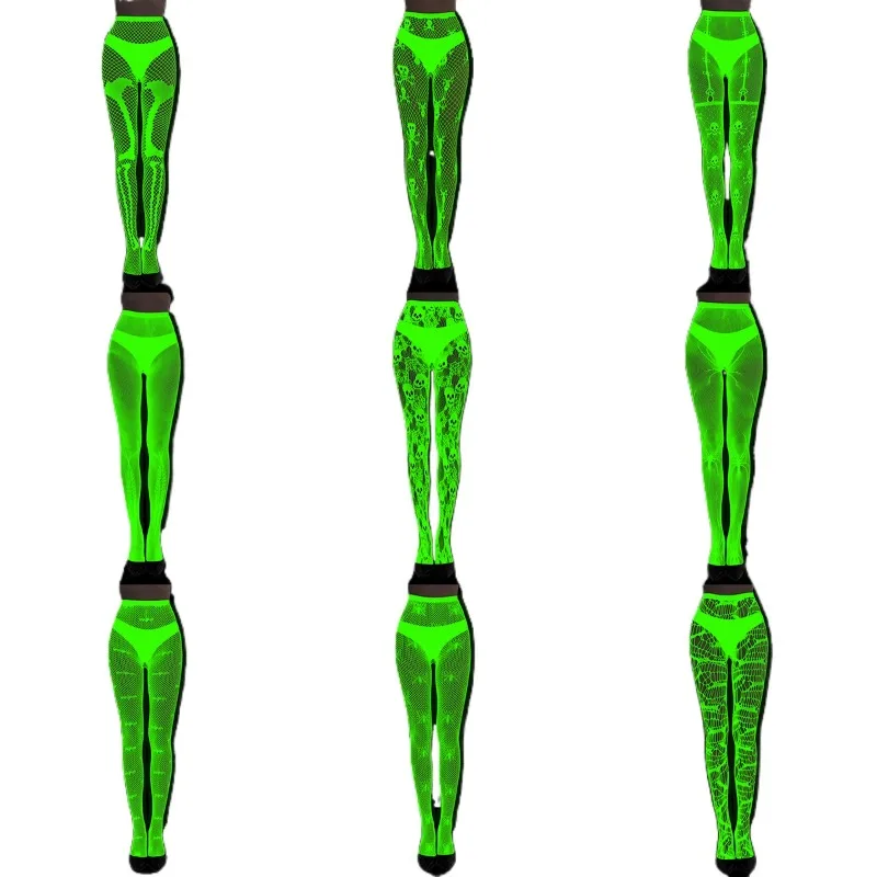Rajstopy fluorescencyjne, świecące pończochy kabaretki, zielone światło, seksowny tatuaż, koronka, żakardowa koronka, ażurowe skarpetki.