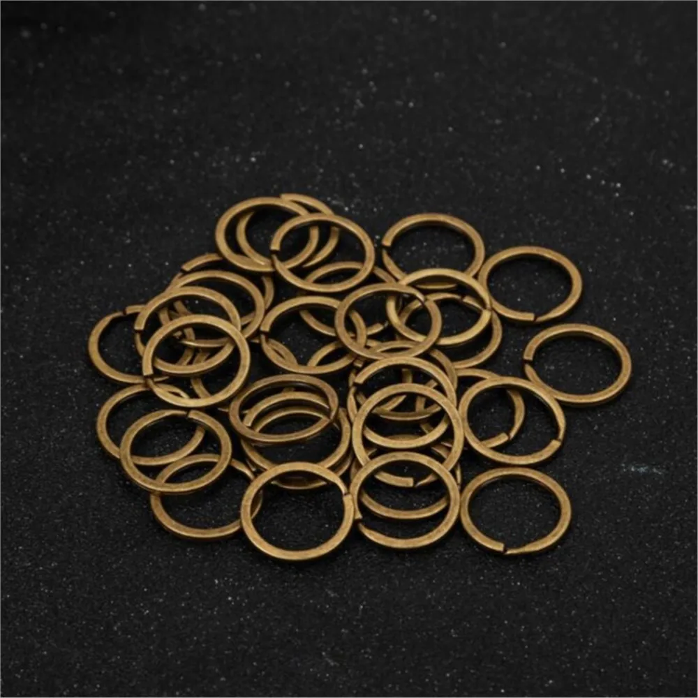 20pcs 25/28/30mm portachiavi piatto in bronzo antico portachiavi con anello diviso in metallo per chiavi di casa per auto organizzazione forniture per la creazione di gioielli