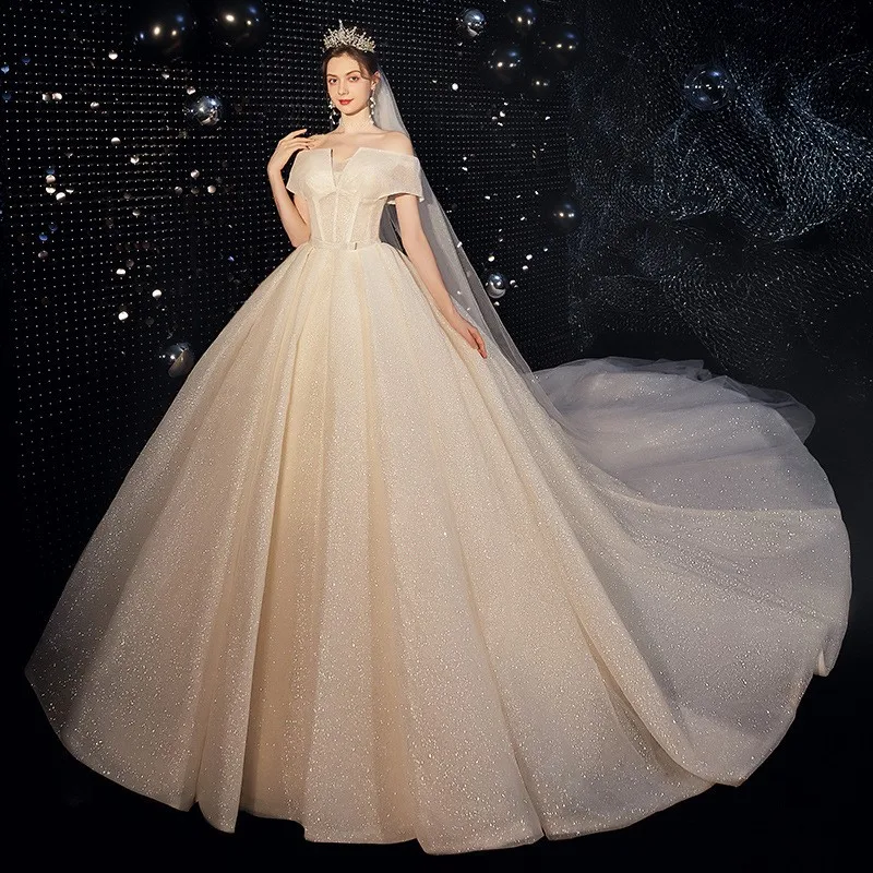 

A new one-shoulder light and ethereal dreamy dress with tail