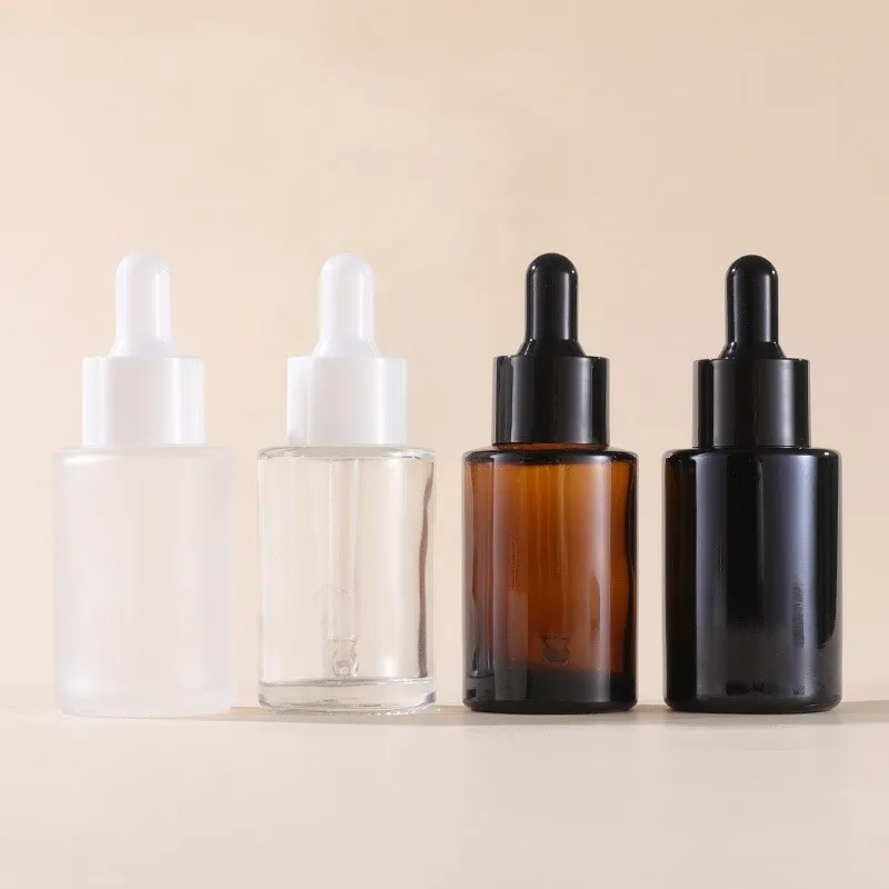 

Clear Frosted Black Pearlescent White Flat Shoulder Glass Dropper Bottles Essential Oil Serum Glass Dropper Bottle Frosted Clear