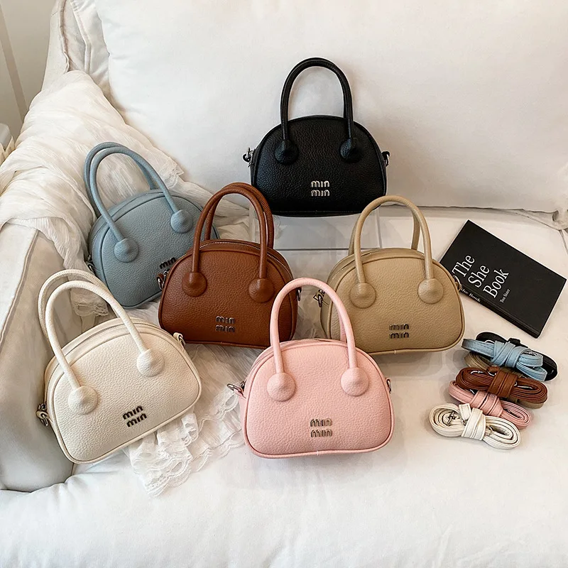 

‌2025 Women's Minimalist Bowling Bag, Premium Leather Convertible Shoulder Tote with Vintage Crossbody Strap