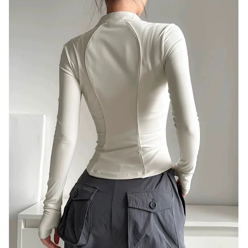 Traje de fitness con media cremallera elástica para ejercicio de yoga de manga larga ajustado para mujer para uso activo