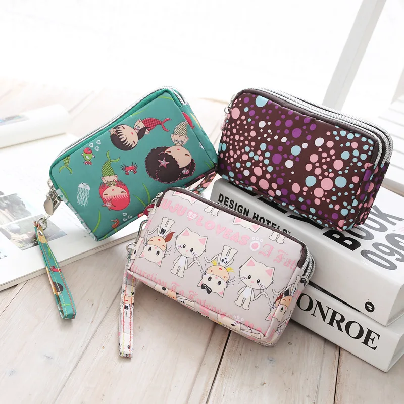 

Mobile phone change bag, hand-held mini canvas bag, women's bag Oxford cloth cartoon fabric bag wholesale