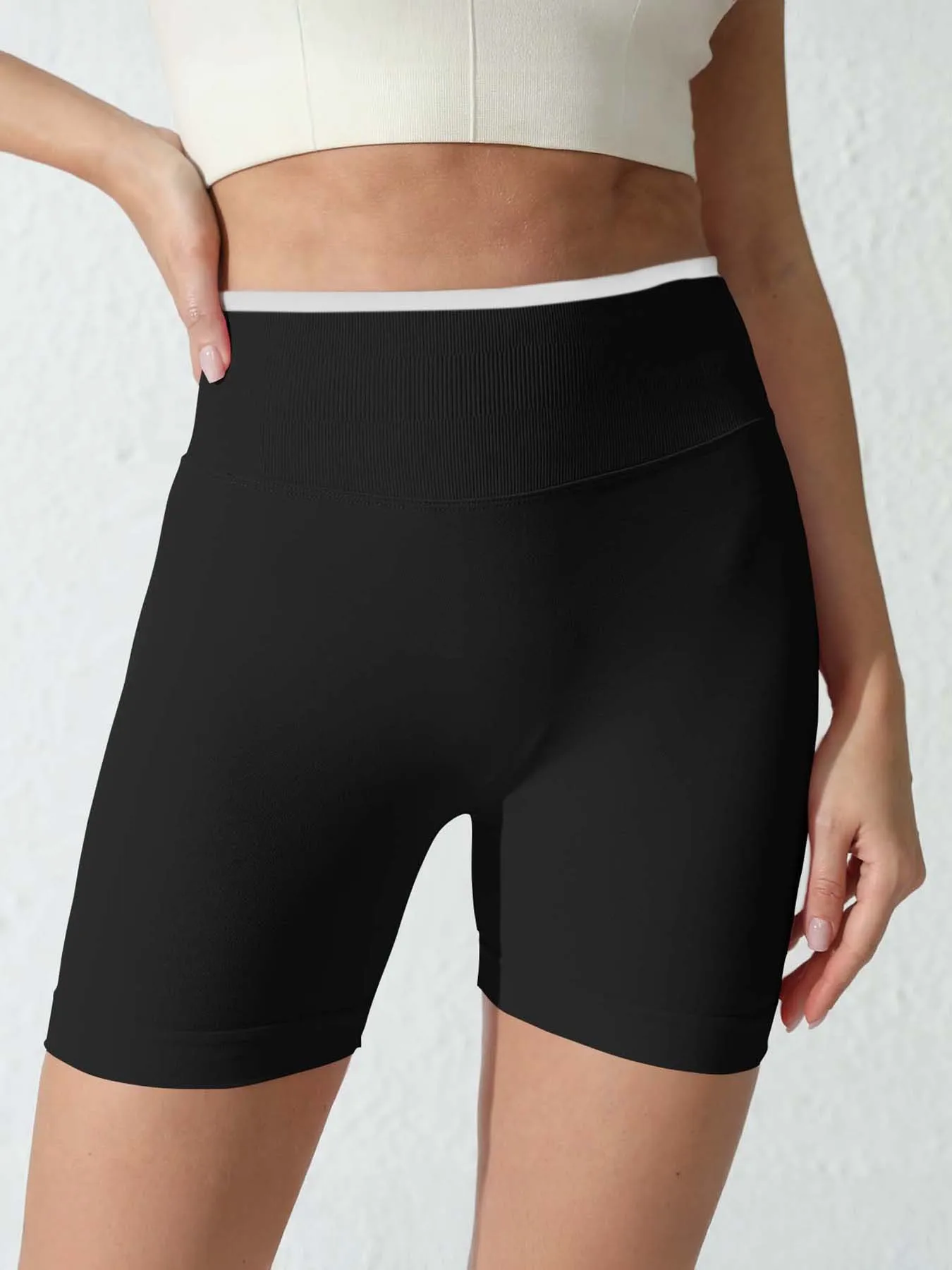 

Seamless color-blocking hemmed yoga shorts, sports and fitness three-inch pants, women's hip-lifting peach shorts