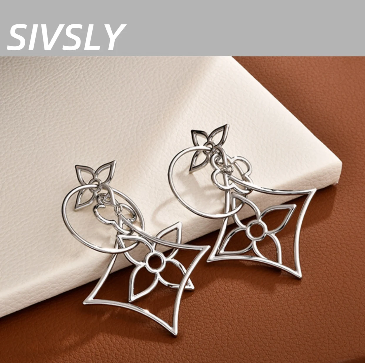 فاخر، راقي، مزاج مبالغ فيه، أشكال هندسية، أقراط مخرمة، شرابات نحيلة، أقراط رائجة البيع