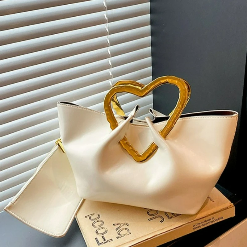 กระเป๋าถือทรงหัวใจสีทองทันสมัย - Women Bags Golden บทวิจารณ์และราคา
