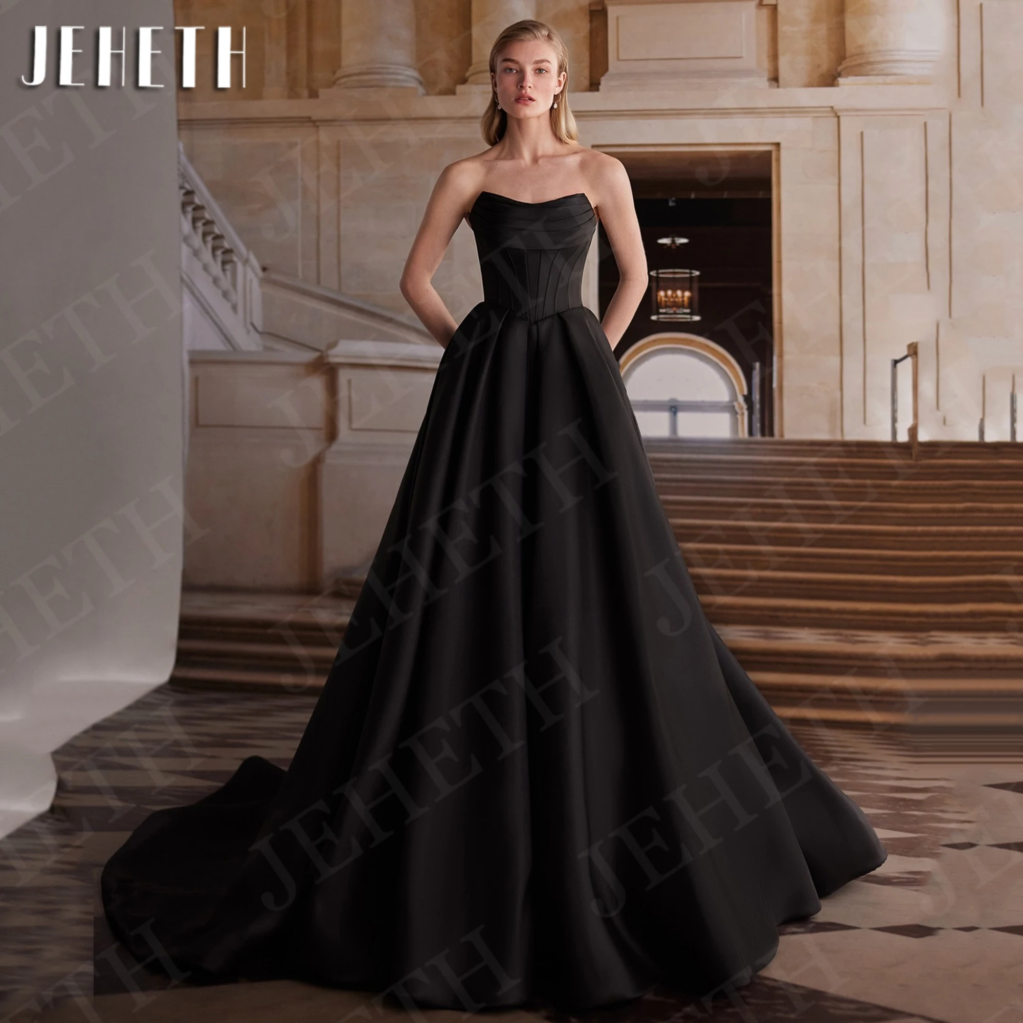 JEHETH Elegant Black Evening Dress A Line Satin Strapless Ceremony Dress Party Sweep Train Pockets Simple فساتين حفلة موسيقية