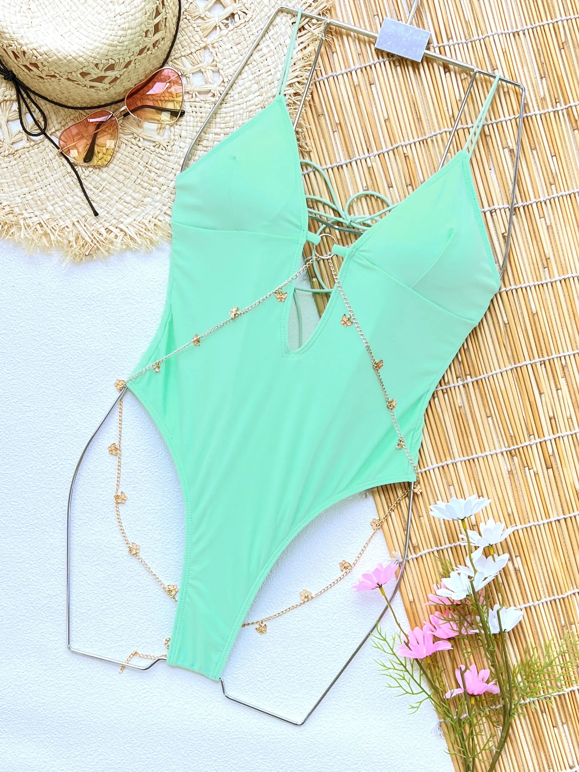 

2025 Style Deep V Neck Women One Piece Swimsuit Fashion Sexy Metal Chain Lady Bodysuit Swimwear Female Backless Beachwear Getway