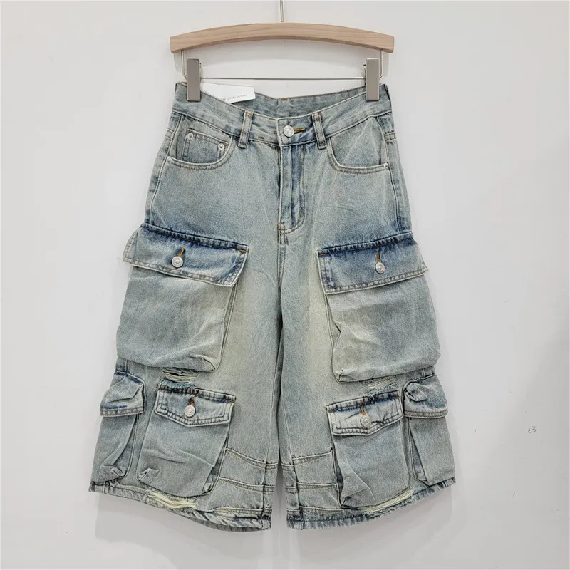 

Multi-Pocket Distressed Denim Shorts. Embrace the utilitarian edge of these relaxed, heavy-duty US high-street shorts.