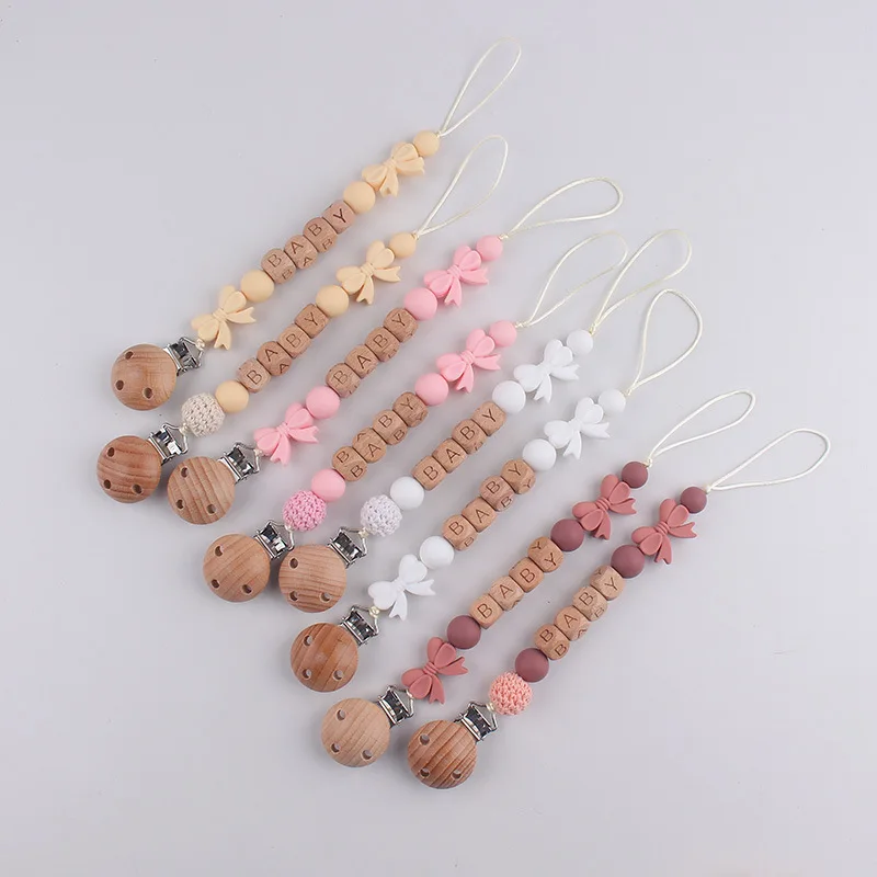 S369e6622105544a7bac47dcfb1a1271e8 - Personalised Dummy Clips UK