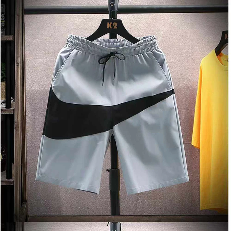 Shorts men's summer trend color blocked loose and versatile casual mid length pants men's sports quick drying beach five quarter