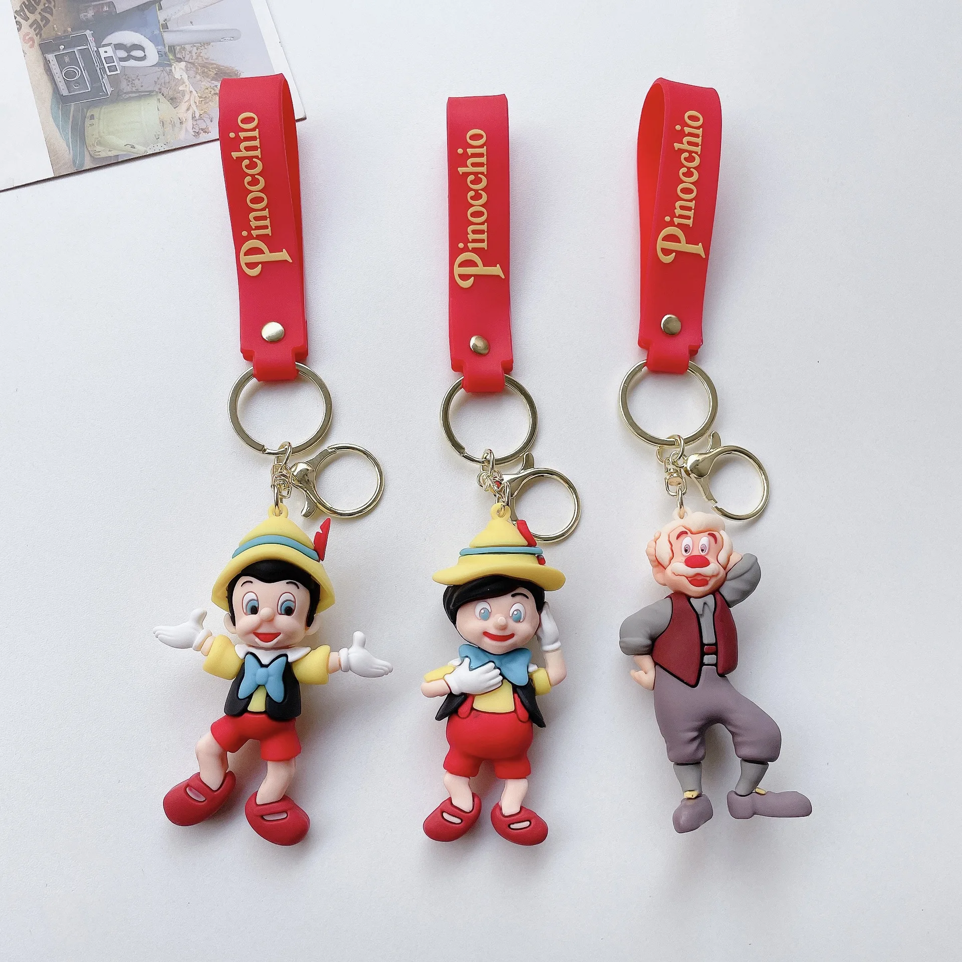 Creative cartoon new Cartoon Pinocchio Key chain creative old carpenter lying long nose boy key bag pendant