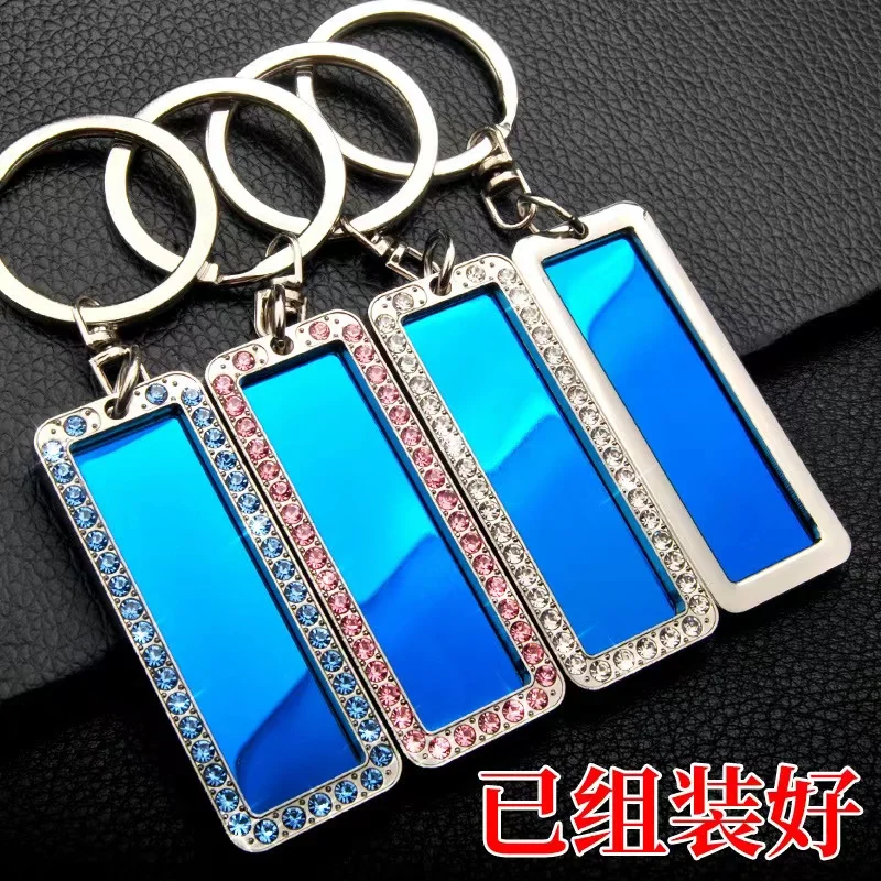 Car license key chain anti-loss pendant creative stainless steel license plate fashion pendants for men and women.