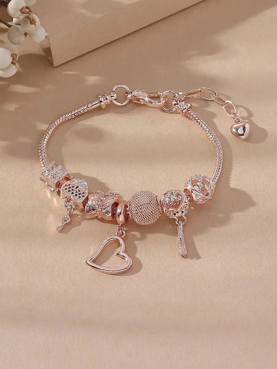 

Rose Gold Tone Snake Chain Bracelet With Heart, Key, Floral And Textured Charms For Women’s Casual Wear, Valentine’s Or