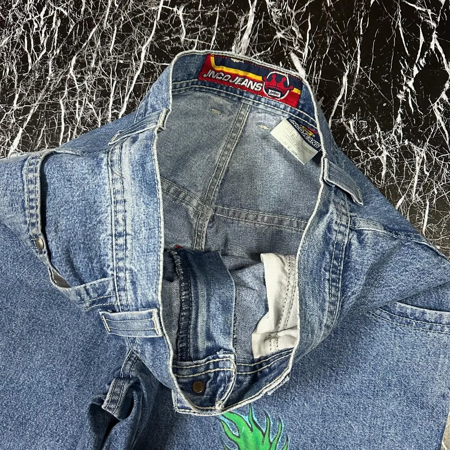 Harajuku JNCO Jeans baru celana panjang Gothic pinggang tinggi Y2K pria Hip Hop dadu grafis bordir celana Jeans longgar Retro biru